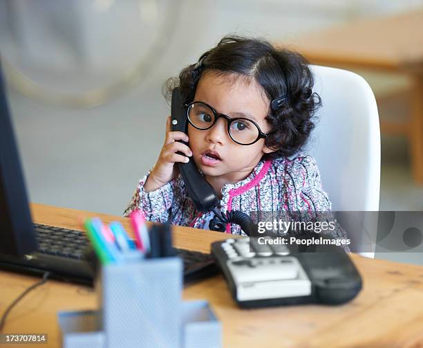 just a regular day at the office - cute little asian girls 個照片及圖片檔