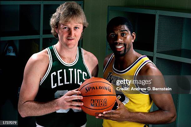 Larry Bird of the Boston Celtics poses for a portrait with Magic Johnson of the Los Angeles Lakers at the Great Western Forum on January 1, 1983 in...