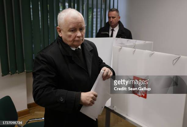 Jaroslaw Kaczynski, leader of the ruling national conservative Law and Justice party , casts his vote in Polish parliamentary elections on October...
