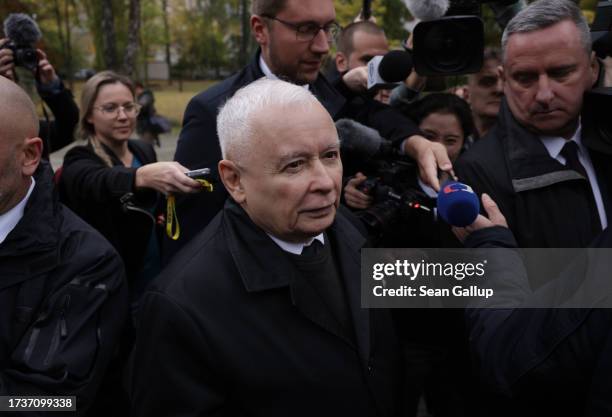 Jaroslaw Kaczynski, leader of the ruling national conservative Law and Justice party , departs after voting in Polish parliamentary elections on...