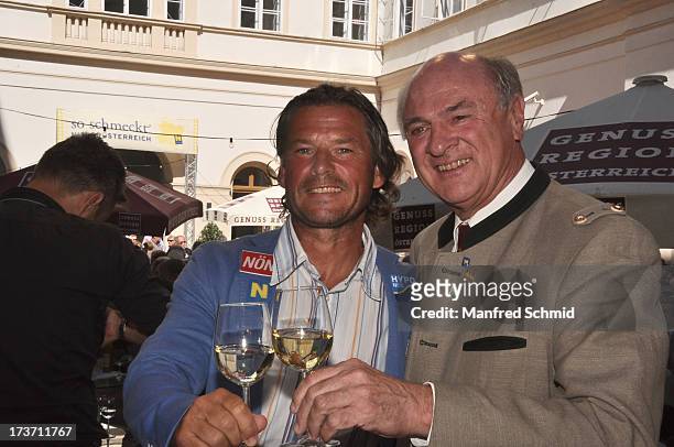 Frenkie Schinkels and governor of Lower Austria Erwin Proell pose for a photograph during the opening of 'Ausg'steckt is' at Palais Niederoesterreich...