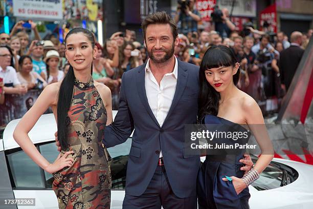 Tao Okamoto, Hugh Jackman and Rila Fukushima attend the UK Premiere of 'The Wolverine' at Empire Leicester Square on July 16, 2013 in London, England.