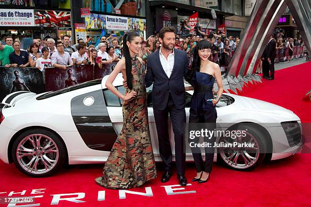 Tao Okamoto, Hugh Jackman and Rila Fukushima attend the UK Premiere of 'The Wolverine' at Empire Leicester Square on July 16, 2013 in London, England.