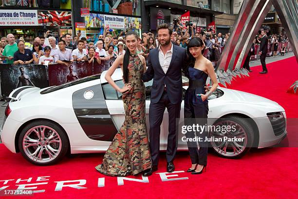 Tao Okamoto, Hugh Jackman and Rila Fukushima attend the UK Premiere of 'The Wolverine' at Empire Leicester Square on July 16, 2013 in London, England.