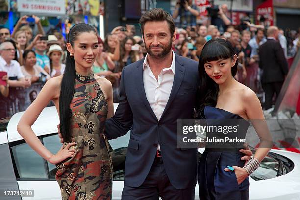 Tao Okamoto, Hugh Jackman and Rila Fukushima attend the UK Premiere of 'The Wolverine' at Empire Leicester Square on July 16, 2013 in London, England.