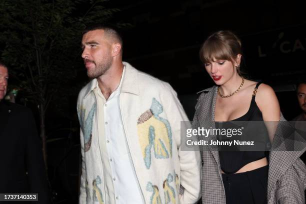 Travis Kelce and Taylor Swift attend CATCH Steak on October 14, 2023 in New York City.