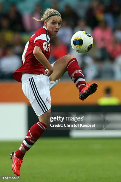 Cecilie Sandvej of Denmark runs with the ball during the UEFA Women's EURO 2013 Group A match between Denmark and Finland at Gamla Ullevi Stadium on...