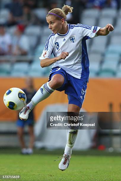 Tuija Hyyrynen of Finland runs with the ball during the UEFA Women's EURO 2013 Group A match between Denmark and Finland at Gamla Ullevi Stadium on...