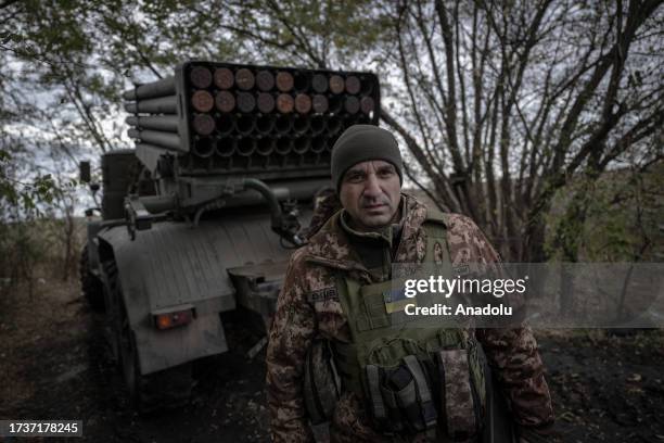 Volodimir, codenamed 'Metis', commander of the reactive artillery group poses for a photo during an exclusive interview as soldiers of the 59th...