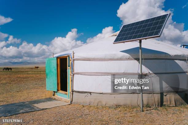 traditional mongolian nomad ger yurt with solar panel - mongolian culture stock pictures, royalty-free photos & images