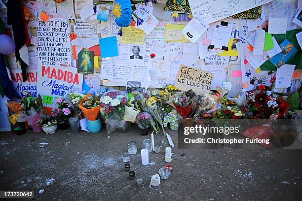 On the eve of Nelson Mandela's 95th birthday well-wishers continue to leave tributes to the former South African President at the memorial wall...