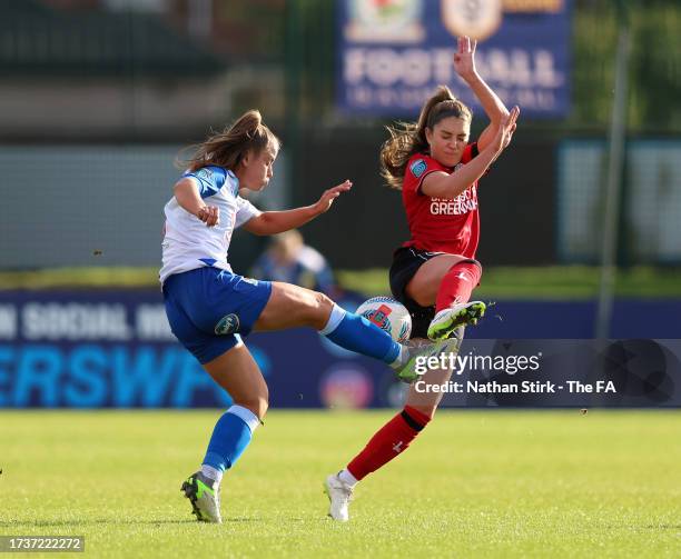 Emma Doyle of Blackburn Rovers is challenged by Carla Humphrey of Charlton Athletic during the Barclays Women's Championship match between Blackburn...