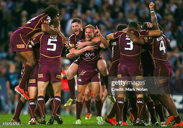 Queensland celebrate winning game three of the ARL State of Origin series between the New South Wales Blues and the Queensland Maroons at ANZ Stadium...