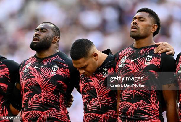 Sam Matavesi of Fiji looks emotional as he lines up for the national anthem following the passing of his father earlier in the week prior to the...