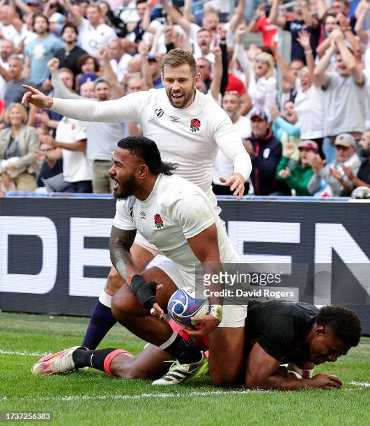 Manu Tuilagi of England celebrates scoring his team's first try during the Rugby World Cup France 2023 Quarter Final match between England and Fiji...