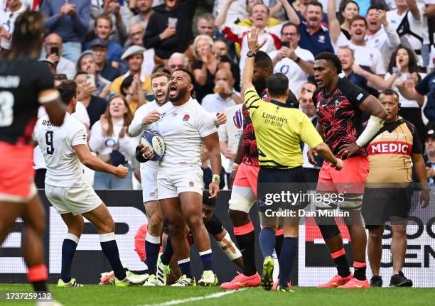 Manu Tuilagi of England celebrates scoring his team's first try during the Rugby World Cup France 2023 Quarter Final match between England and Fiji...