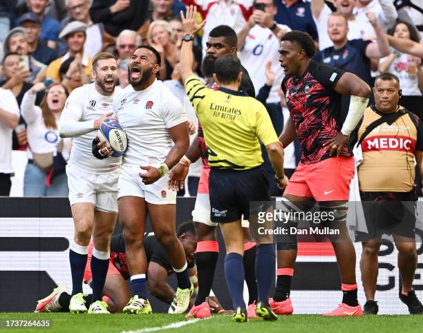 Manu Tuilagi of England celebrates scoring his team's first try during the Rugby World Cup France 2023 Quarter Final match between England and Fiji...