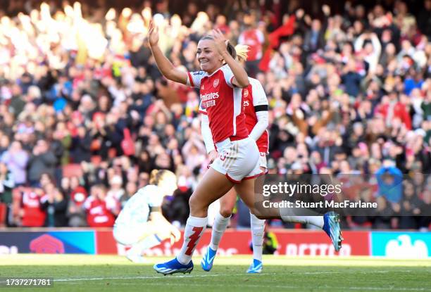 Katie McCabe of Arsenal celebrates after scoring the team's first goal during the Barclays Women's Super League match between Arsenal FC and Aston...