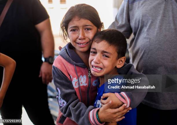 Children crying because of Israeli air raids on October 15, 2023 in Khan Yunis, Gaza. Many Gazan citizens have fled to the south following warnings...