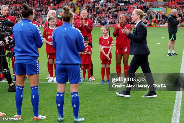 Former Liverpool footballer, Natasha Dowie is applauded prior to the Barclays Women's Super League match between Liverpool FC and Everton FC at...