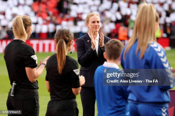 Former Liverpool footballer, Natasha Dowie is applauded prior to the Barclays Women's Super League match between Liverpool FC and Everton FC at...