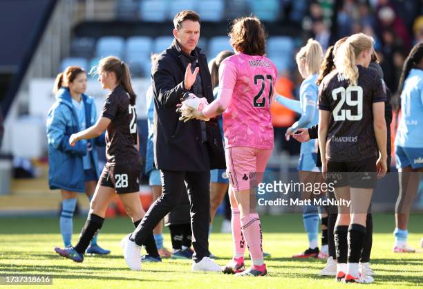 Gareth Taylor, Manager of Manchester City, shakes hands with Kaylan Marckese of Bristol City during the Barclays Women's Super League match between...