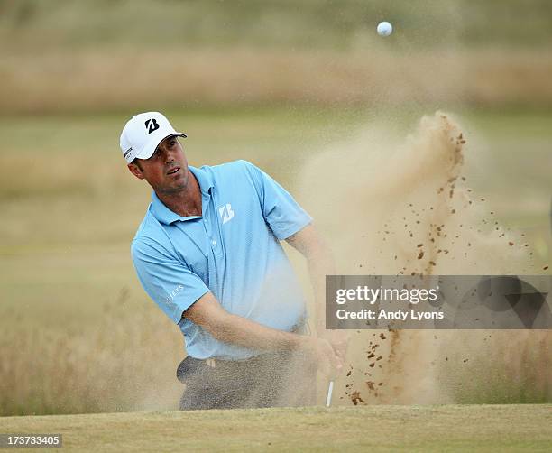 Matt Kuchar of the United States hits a shot ahead of the 142nd Open Championship at Muirfield on July 17, 2013 in Gullane, Scotland.