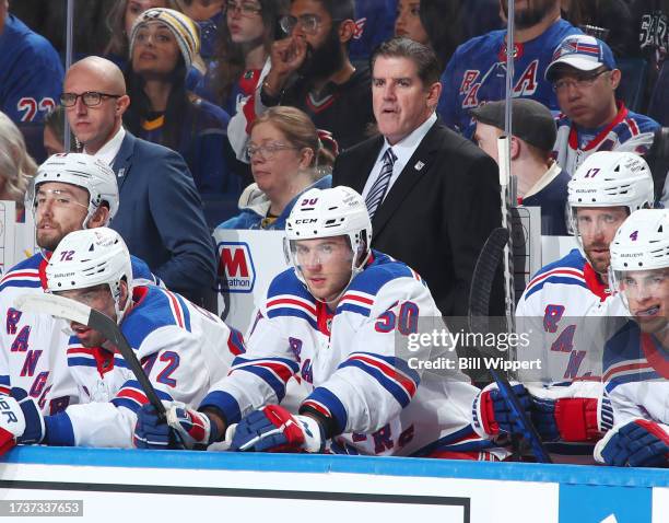 Assistant coach Dan Muse and head coach Peter Laviolette watch the action against the Buffalo Sabres during an NHL game on October 12, 2023 at...