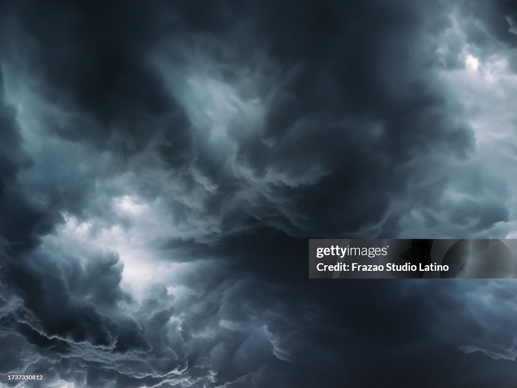 Threatening dark clouds covering the sky