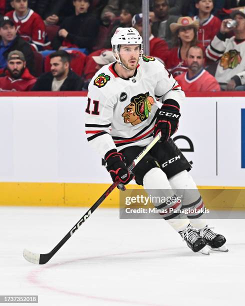 Taylor Raddysh of the Chicago Blackhawks skates during the first period against the Montreal Canadiens at the Bell Centre on October 14, 2023 in...