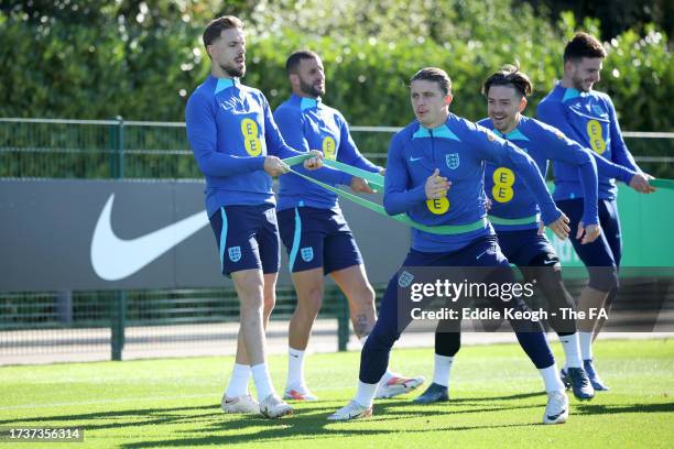 Jordan Henderson, Conor Gallagher, Kyle Walker, Jack Grealish and Declan Rice of England in action during a training session at Spurs Lodge on...