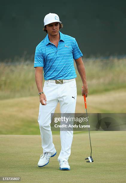 Rickie Fowler of the United States watches a putt ahead of the 142nd Open Championship at Muirfield on July 17, 2013 in Gullane, Scotland.
