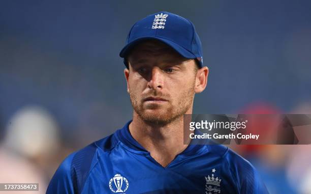 Jos Buttler of England looks on following the ICC Men's Cricket World Cup India 2023 between England and Afghanistan at Arun Jaitley Stadium on...