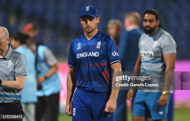 Jos Buttler of England looks on following the ICC Men's Cricket World Cup India 2023 between England and Afghanistan at Arun Jaitley Stadium on...