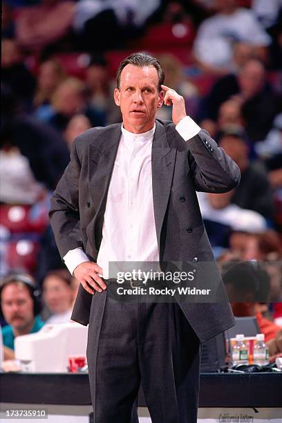 Head Coach Doug Collins of the Detroit Pistons looks on against the Sacramento Kings during a game played on February 26, 1996 at Arco Arena in...