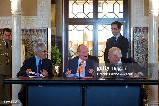 Lahcen Daoudi, King Juan Carlos of Spain and Spanish Minister of Foreign Affairs Jose Manuel Garcia Margallo attend a meeting of heads of...