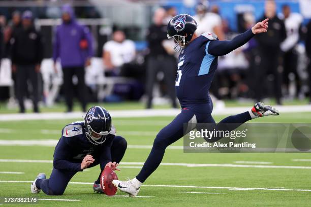 Nick Folk of the Tennessee Titans kicks a field goal in the fourth quarter during the 2023 NFL London Games match between Baltimore Ravens and...