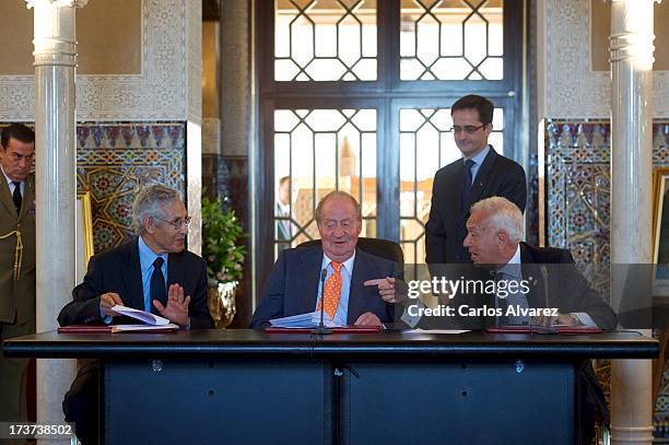 Lahcen Daoudi, King Juan Carlos of Spain and Spanish Minister of Foreign Affairs Jose Manuel Garcia Margallo attend a meeting of heads of...