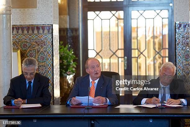 Lahcen Daoudi, King Juan Carlos of Spain and Spanish Minister of Foreign Affairs Jose Manuel Garcia Margallo attend a meeting of heads of...