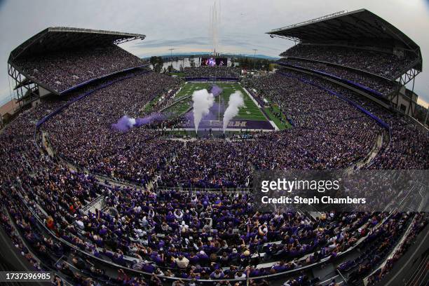 General scenic view as fans cheer as the Washington Huskies take the field before the game against the Oregon Ducks at Husky Stadium on October 14,...