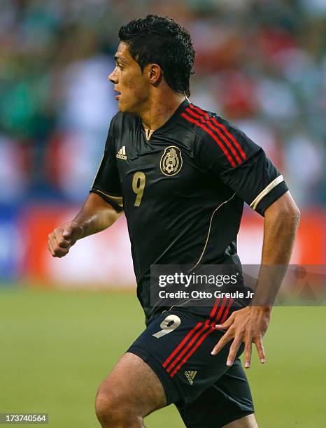 Raul Jimenez of Mexico follows the play against Canada at CenturyLink Field on July 11, 2013 in Seattle, Washington.