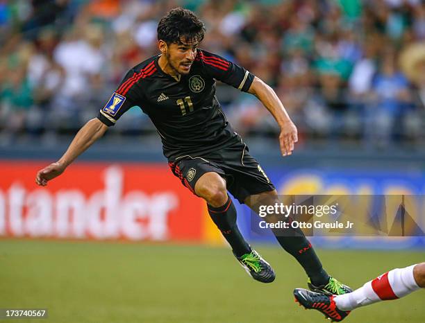 Rafael Marquez Lugo of Mexico follows the play against Canada at CenturyLink Field on July 11, 2013 in Seattle, Washington.