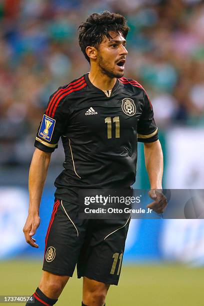 Rafael Marquez Lugo of Mexico follows the play against Canada at CenturyLink Field on July 11, 2013 in Seattle, Washington.