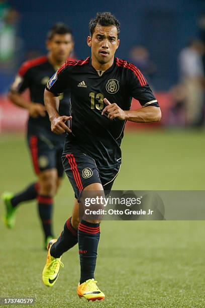Adrian Aldrete of Mexico follows the play against Canada at CenturyLink Field on July 11, 2013 in Seattle, Washington.