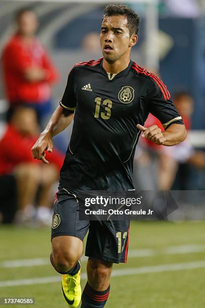 Adrian Aldrete of Mexico follows the play against Canada at CenturyLink Field on July 11, 2013 in Seattle, Washington.