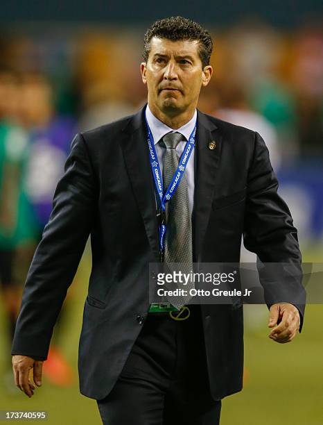 Head coach Jose Manuel de la Torre of Mexico walks off the pitch after the match against Canada at CenturyLink Field on July 11, 2013 in Seattle,...