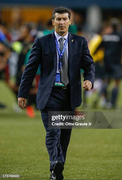 Head coach Jose Manuel de la Torre of Mexico walks off the pitch after the match against Canada at CenturyLink Field on July 11, 2013 in Seattle,...