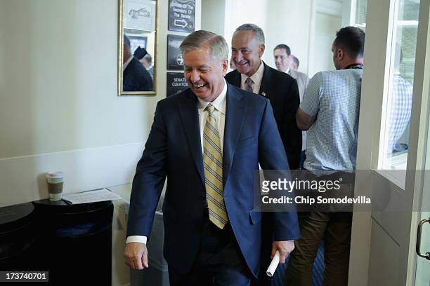 Sen. Lindsey Graham and U.S. Sen. Charles Schumer leave a news conference about media shield legislation they co-sponsored with others at the U.S....