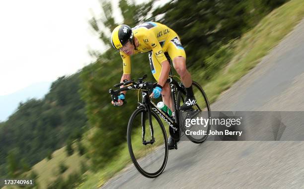 Christopher Froome of Great Britain and Team Sky Procycling consolidates his leader's yellow jersey by winning stage seventeen of the 2013 Tour de...