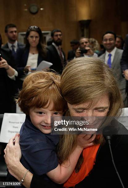 Declan Power Sunstein hugs his mother, Samantha Power, the nominee to be the U.S. Representative to the United Nations, at the conclusion of her...